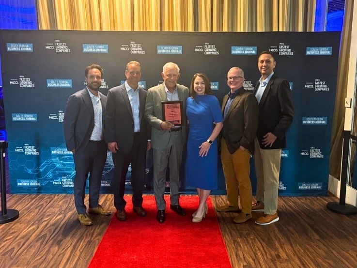 Locality Bank team members celebrating the #1 Fastest Growing Company of 2025 award from the South Florida Business Journal.