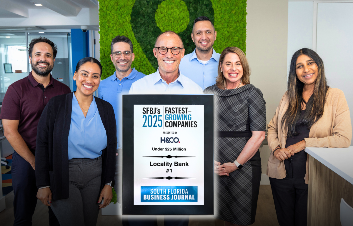 Locality Bank team members and the award for the #1 Fastest Growing Company of 2025 from the South Florida Business Journal.